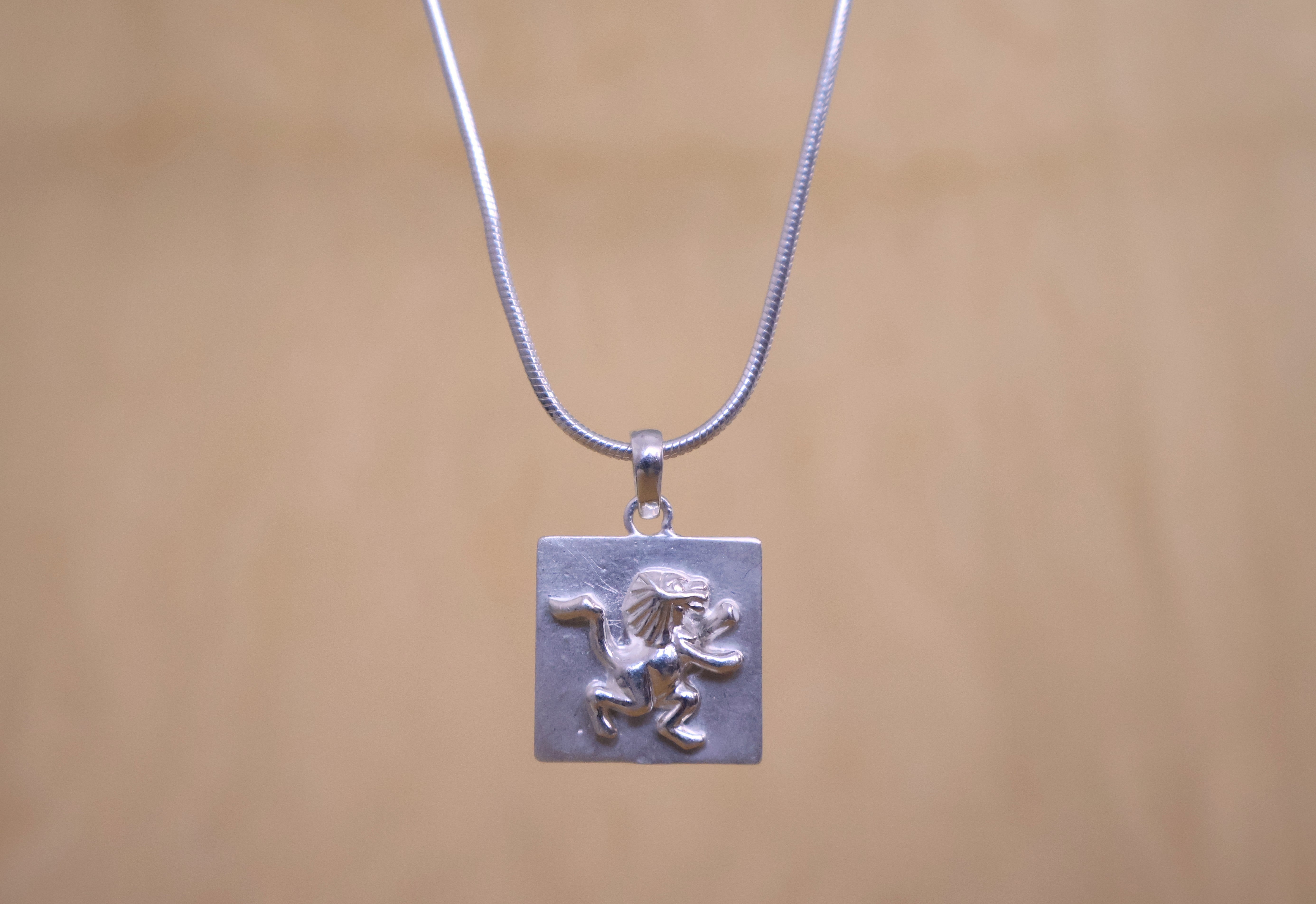 Regal Elegance: Pure Silver Leo Pendant